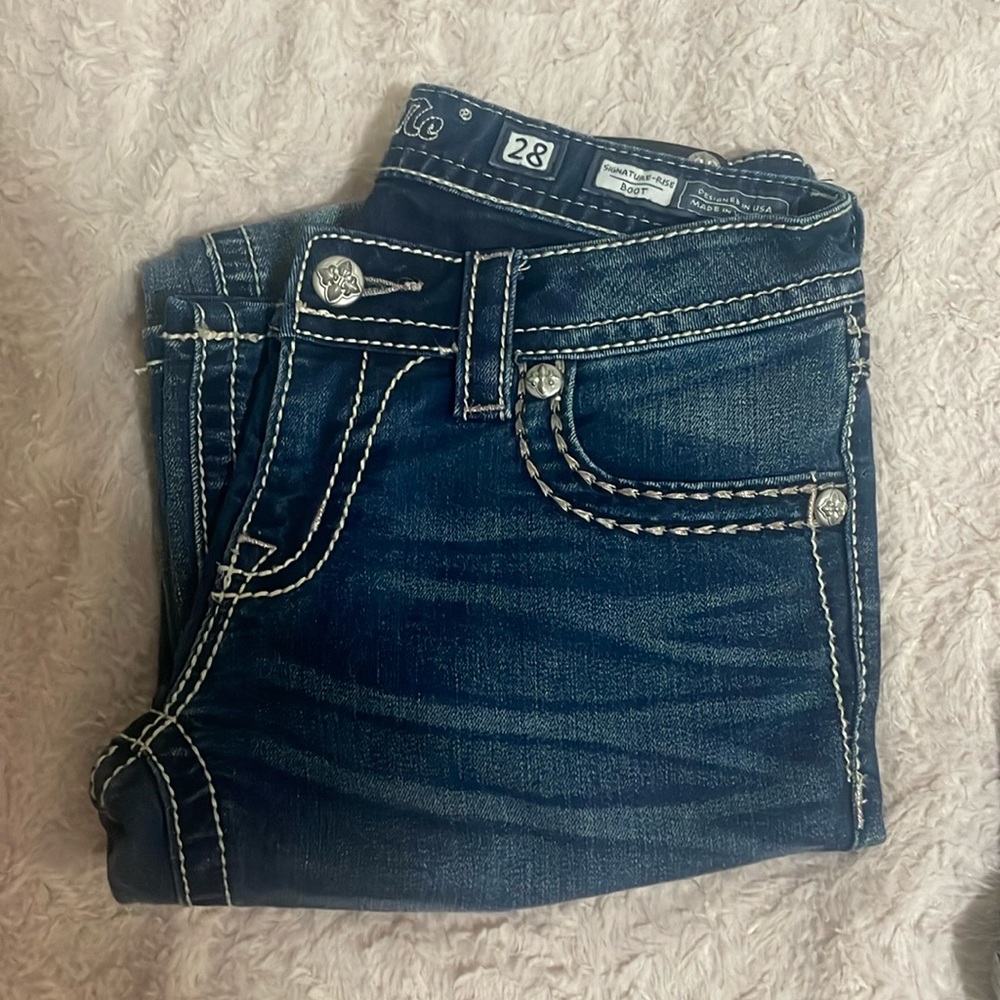 Miss me low rised boot cut jeans. size 28 , slightly used